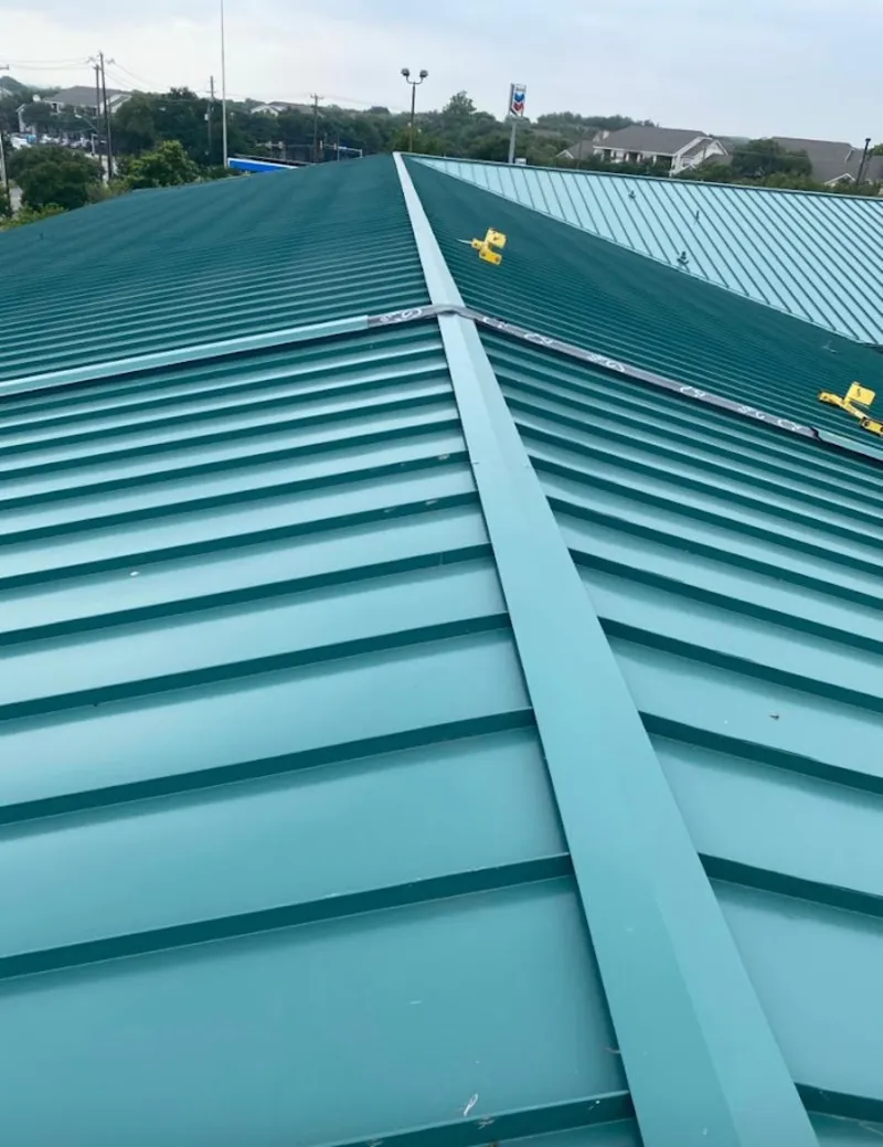 Green commercial metal roof ridge and valley for Metal Roof Repair in Sugarmill Woods